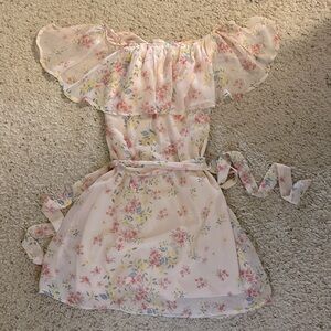 Gorgeous dress in perfect condition with no flaws, brand is blue rain.